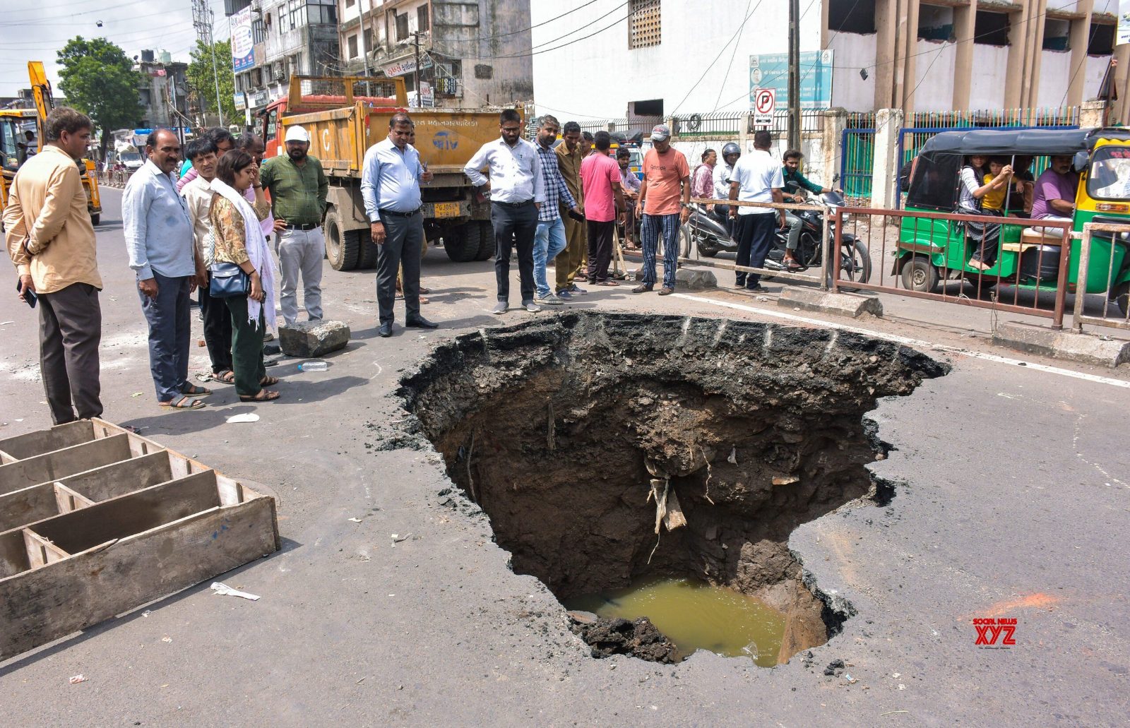 File photo of a large road sinkhole on an Indian city street